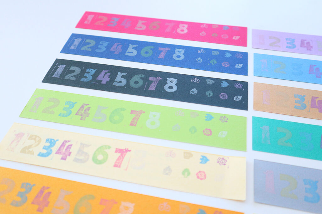 スタンプパッド「ベルクルール」で12色の紙に押してみた