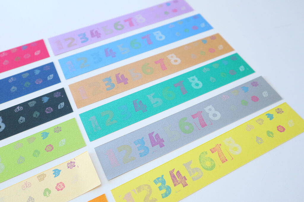 スタンプパッド「ベルクルール」で12色の紙に押してみた